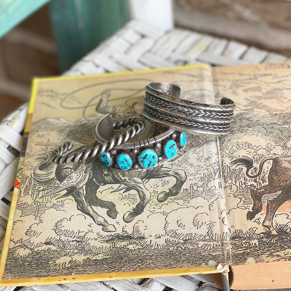 Vintage Navajo made sterling cuff bracelets