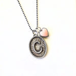 Handmade sterling silver initial necklace with pink conch heart