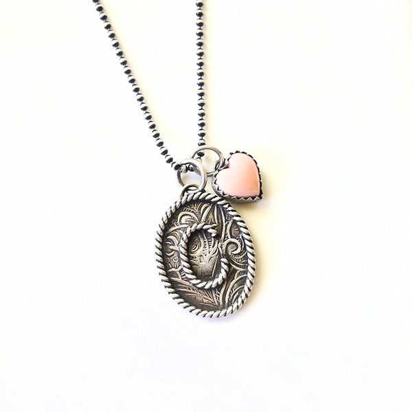Handmade sterling silver initial necklace with pink conch heart