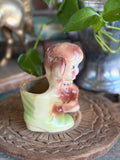 Vintage ceramic dog and boot planter