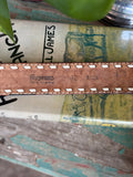 Vintage 32” tooled leather backstitch belt and angus buckle