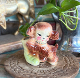 Vintage ceramic dog and boot planter