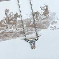 Vintage sterling silver longhorn necklace with turquoise stones