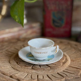 Tiny vintage ceramic Tennessee souvenir teacup and saucer set
