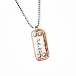 Hand stamped custom sterling and copper necklace