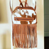Cowhide and leather fringe backpack