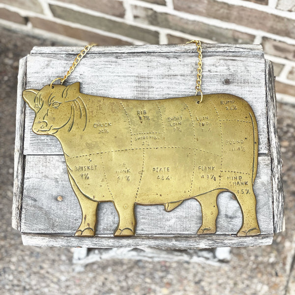 Vintage brass cuts of beef sign