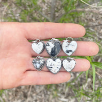 Handmade white buffalo heart pendants