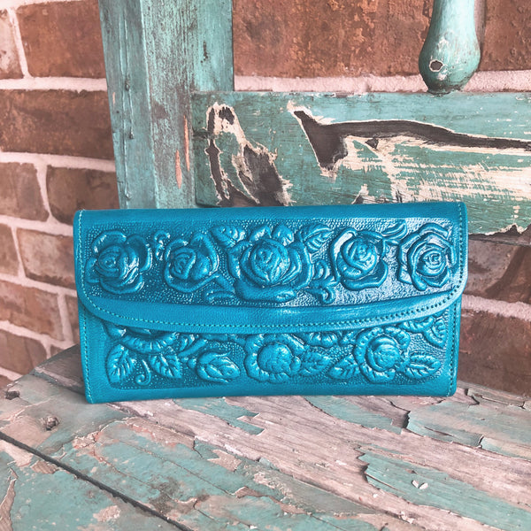 Turquoise leather trifold wallet with roses