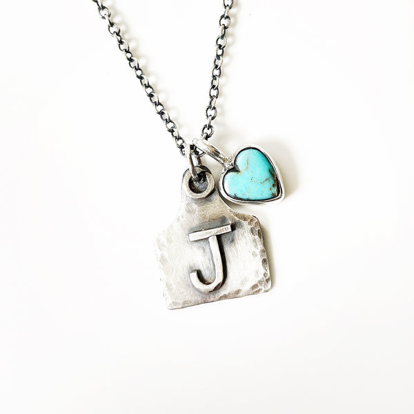 Handmade sterling silver ear tag and turquoise heart necklace