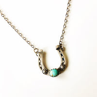 Sterling silver horseshoe necklace with turquoise