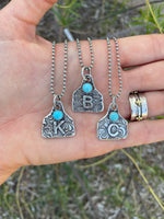 Handmade sterling silver ear tag initial necklaces