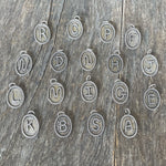 Handmade sterling initial pendants