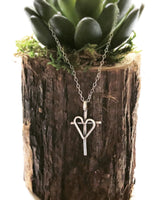 Sterling silver heart and cross necklace