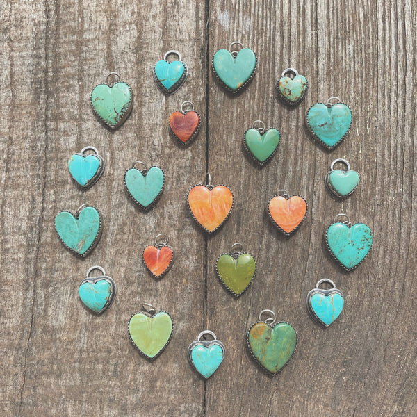 Assorted handmade sterling silver heart pendants