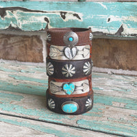 Handmade sterling and leather bracelets
