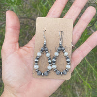 2.5” sterling Navajo pearl and freshwater pearl earrings