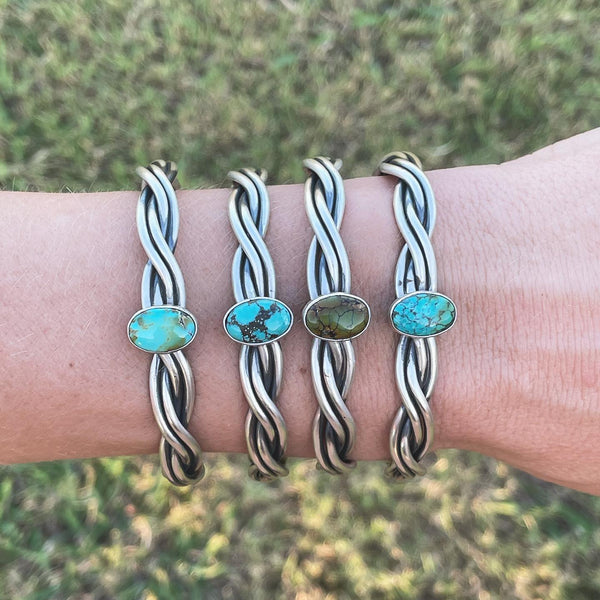 Navajo made sterling silver cuffs with turquoise stone